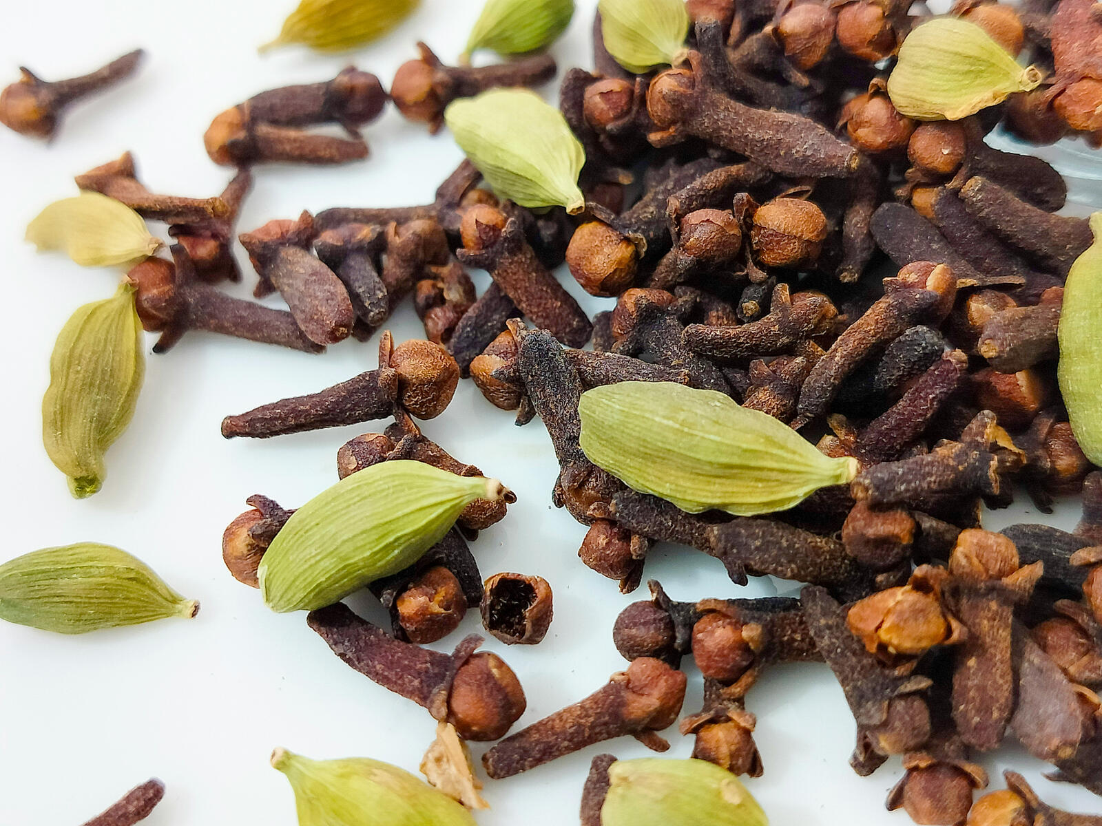 Spices Cloves Black Pepper Cardamom.